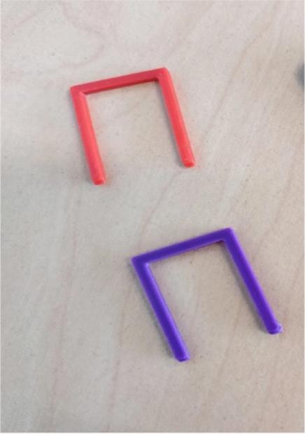 Staples 3D printed with carbon fibre reinforced nylon 6 (CF-PA6).